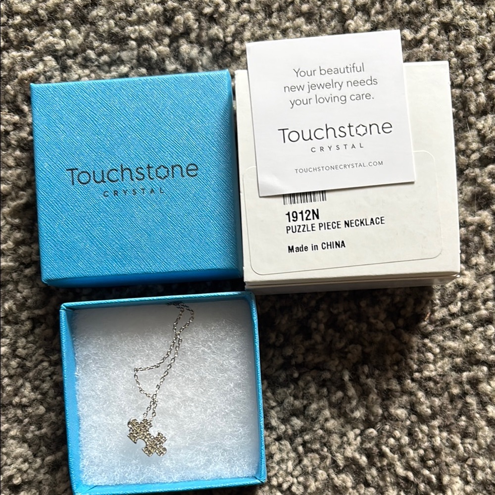Touchstone Crystal Silver Puzzle Piece Pendant Necklace